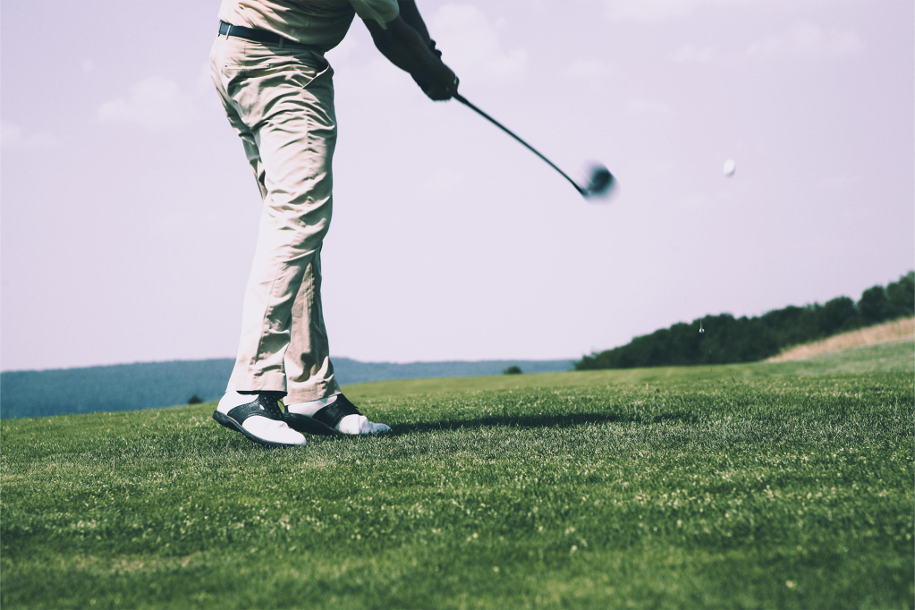 golfer taking a swing